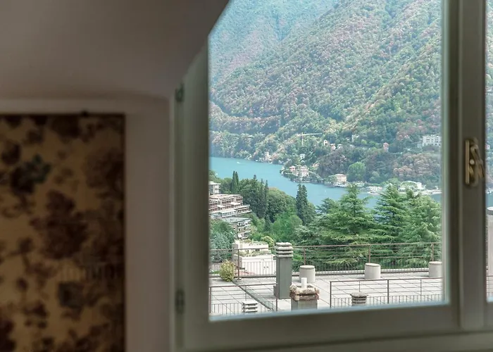 Apartment I D'a Charming Penthouse - View- Como- House-130 Mt-2 Double Bedrooms And 2 Double Bathrooms A Spacious Living Room-full Equipped Kitchen-private Garden And Terrace-private Covered Parking *